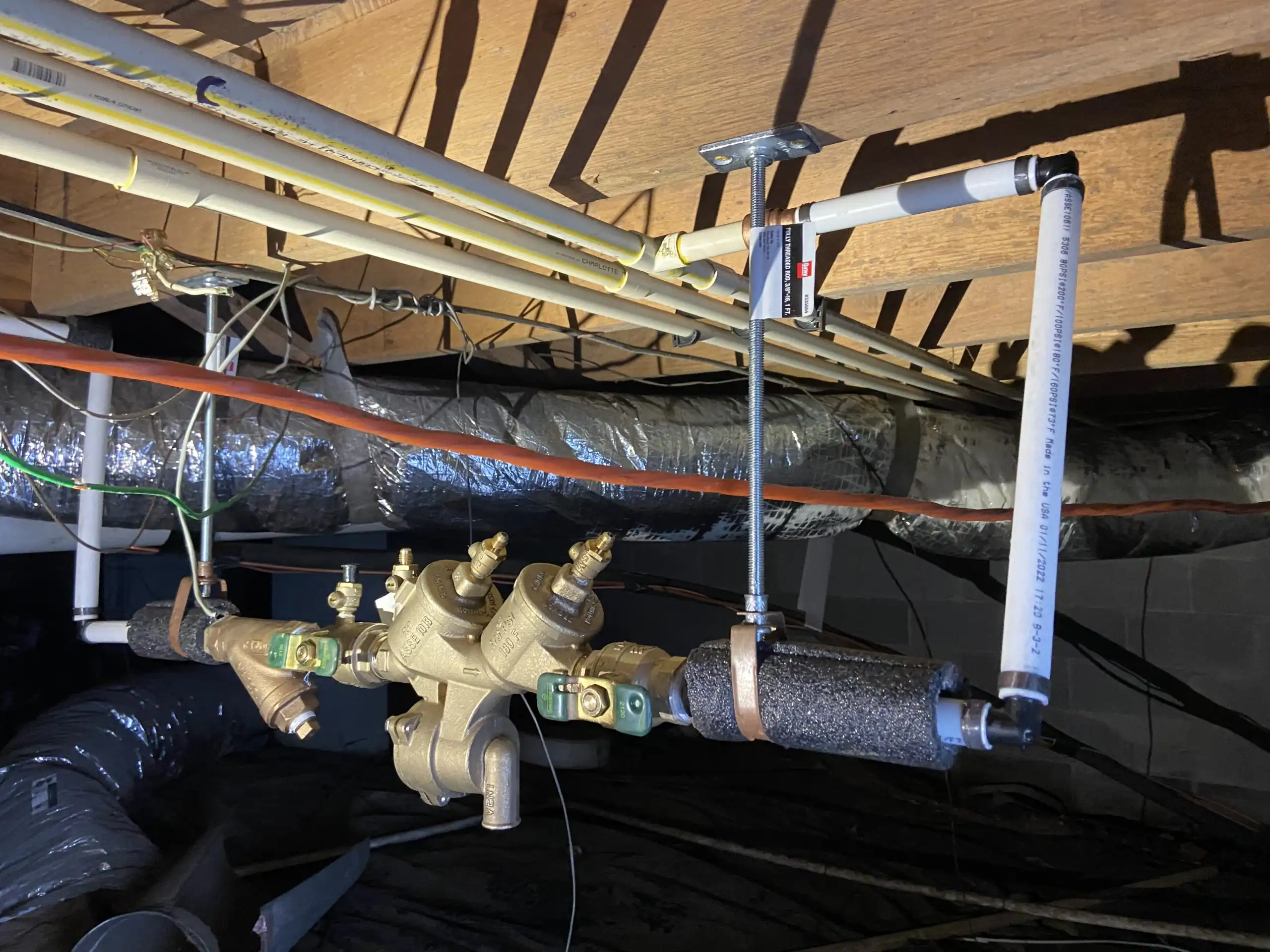 pipe system in ceiling of basement
